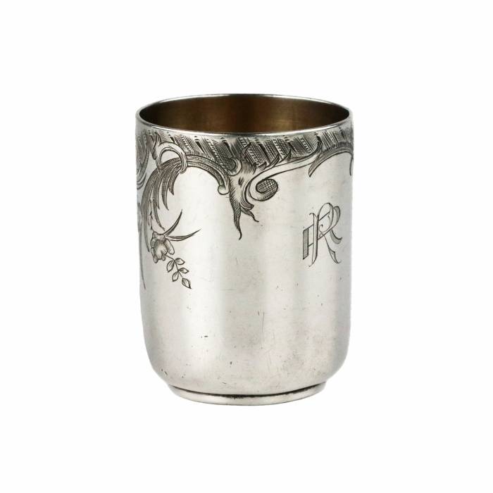 Ovchinnikov`s silver vodka cup with baroque ligature along the edge of the body. Last quarter of the 19th century. 