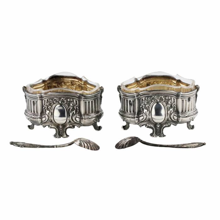 Pair of Louis XV style silver salt shakers. With spoons and original case. 