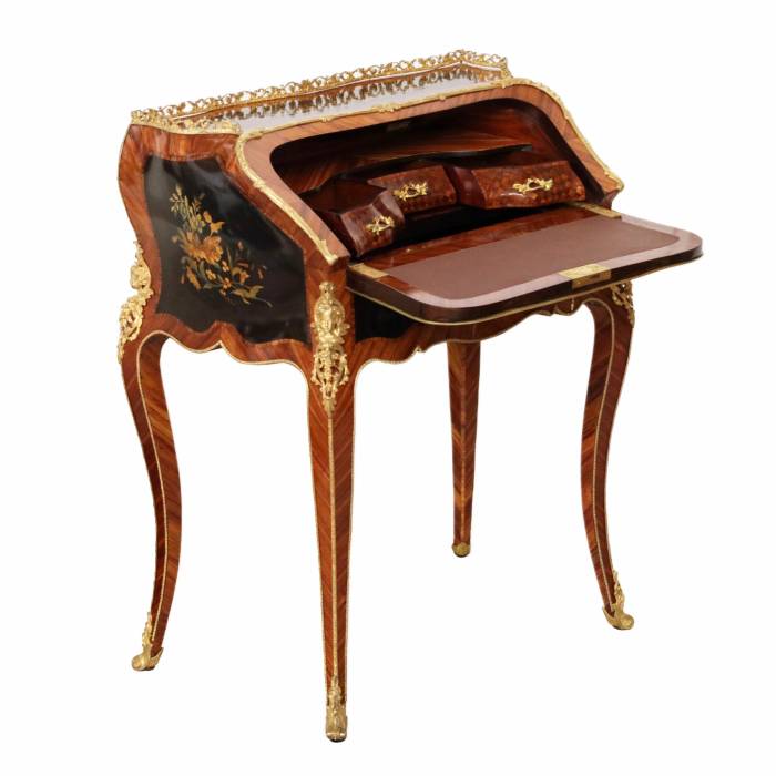 Coquettish ladies` bureau in wood and gilded bronze, Louis XV style. 