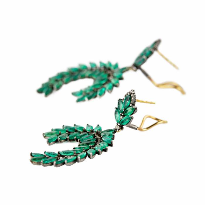 Silver earrings with emeralds and diamonds. 