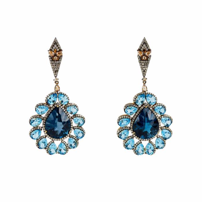 Silver earrings with topazes and diamonds. 