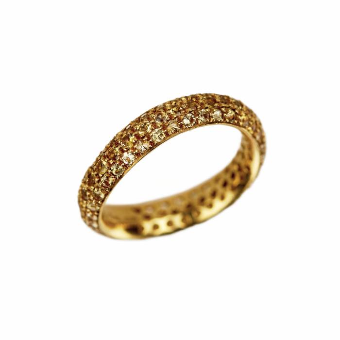 18K yellow gold ring. Pomellato, with Yellow Sapphire Wave Band. 