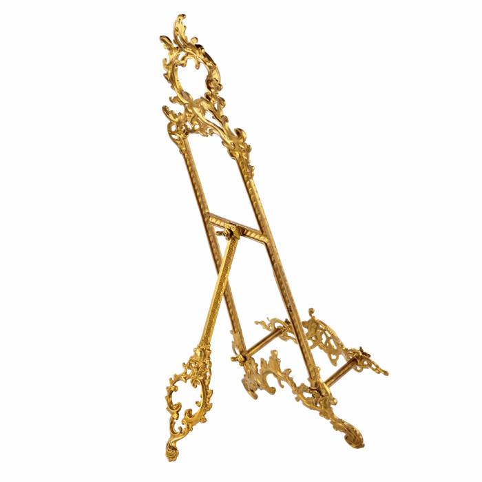 Table easel in gilded bronze in the Rococo style. 