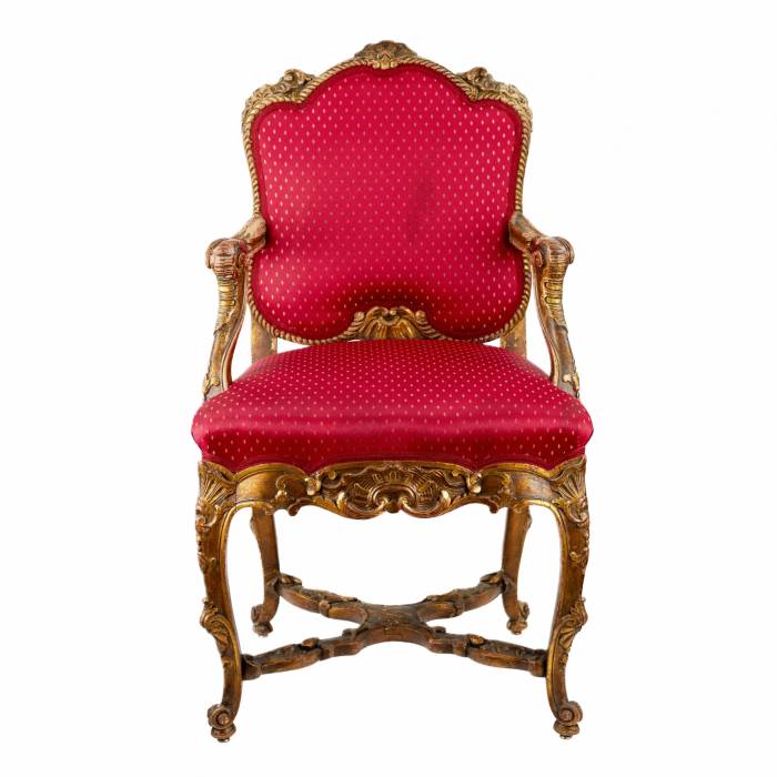 Magnificent, carved chair in the Rococo style of the 19th-20th centuries. 