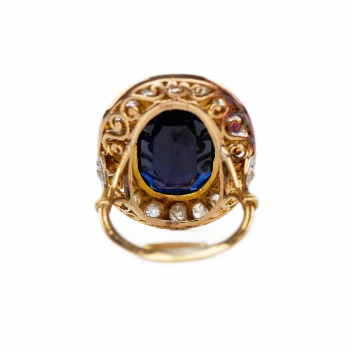 Gold, platinum ring with sapphire and diamonds. 