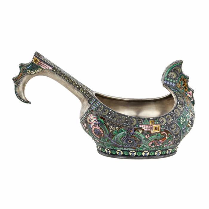 A graceful silver kovsh in the Russian Art Nouveau style of the 11th Moscow artel. Early 20th century.