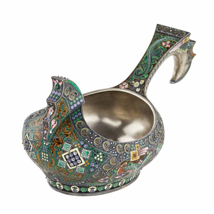 A graceful silver kovsh in the Russian Art Nouveau style of the 11th Moscow artel. Early 20th century.