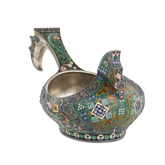 A graceful silver kovsh in the Russian Art Nouveau style of the 11th Moscow artel. Early 20th century.
