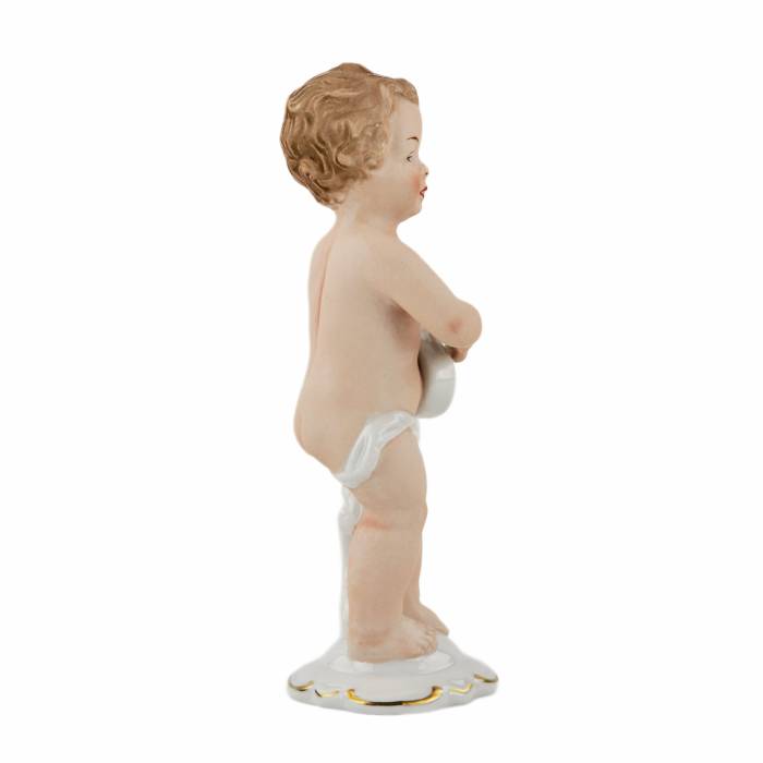 Porcelain figurine of a putti playing guitar. Germany.