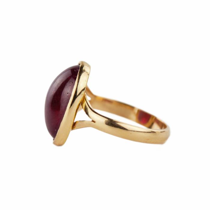 Golden ring with ruby. 
