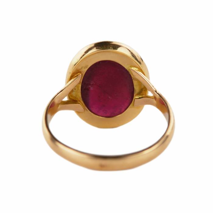Golden ring with ruby. 
