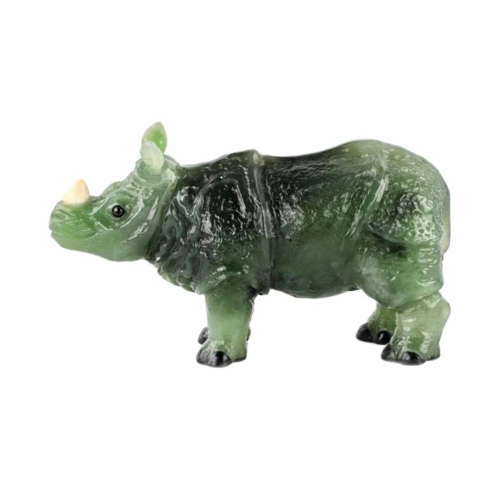 Stone-cutting miniature Jade rhinoceros in the style of products from the Faberge firm