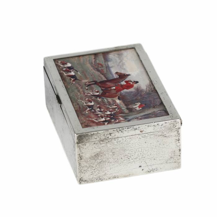 Wooden box upholstered with silver-plated metal. 20th century.