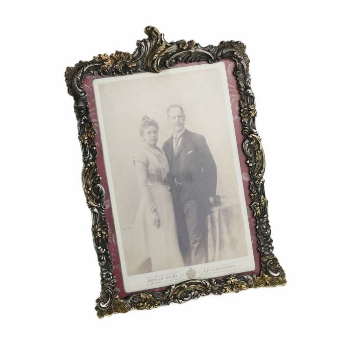 Silver photo frame in neo-baroque style. 20th century. 