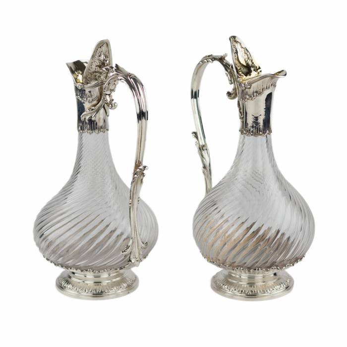 Pair of French, spiral glass wine jugs with silver. Late 19th century. 