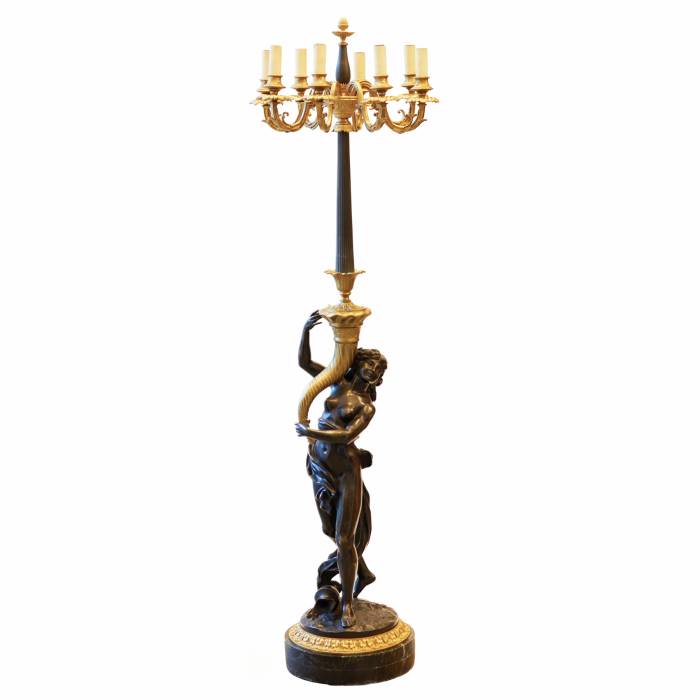 French floor lamp made of gilded and patinated bronze. The turn of the 19th and 20th centuries. 