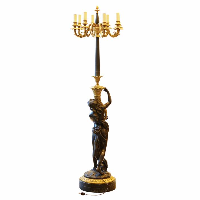 French floor lamp made of gilded and patinated bronze. The turn of the 19th and 20th centuries. 