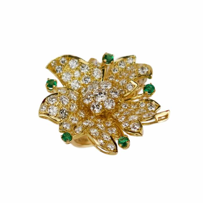 Gold 18K ring with seventy-seven diamonds and five emeralds. 