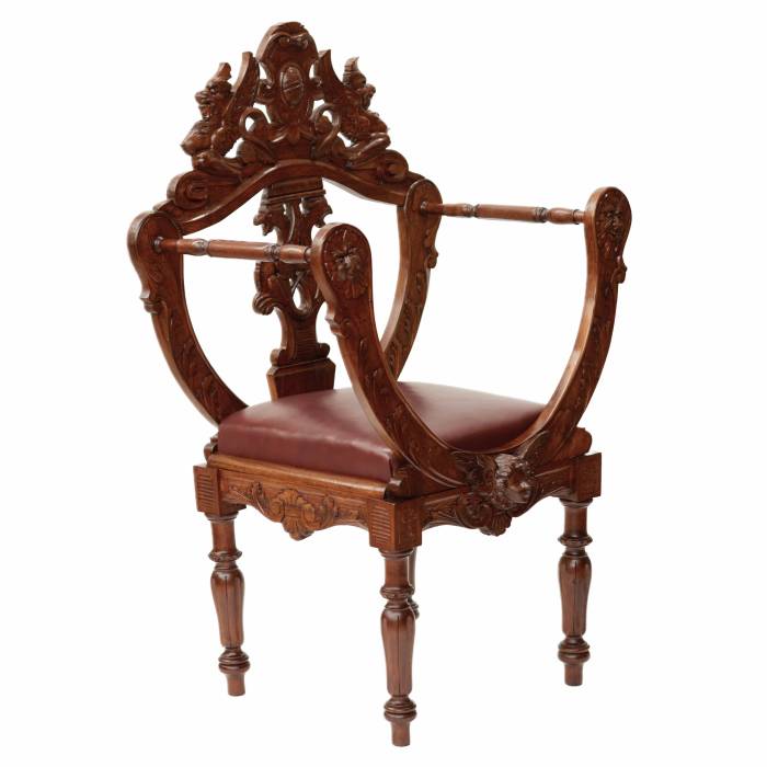 Carved, richly decorated walnut chair. 19th century