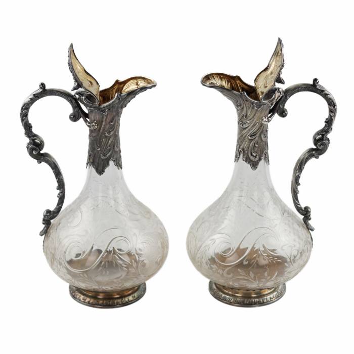 Pair of wine glass jugs in silver, Louis XV style, turn of the 19th-20th centuries. 