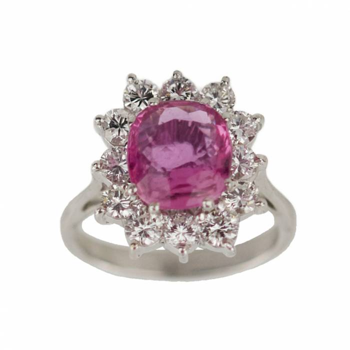 Gold ring with pink ruby and diamonds. 