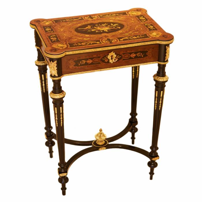 A lovely inlaid wood dressing table with gilded bronze. France late 19th century. 