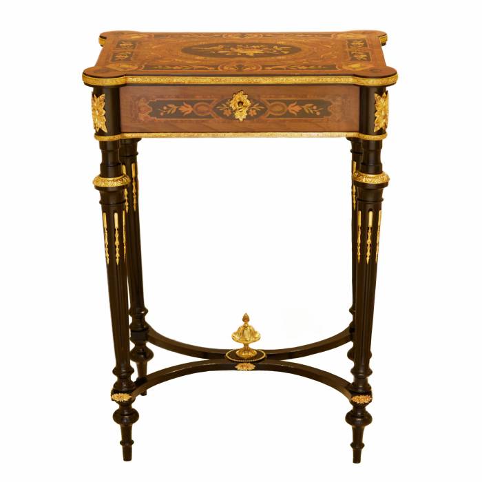 A lovely inlaid wood dressing table with gilded bronze. France late 19th century. 