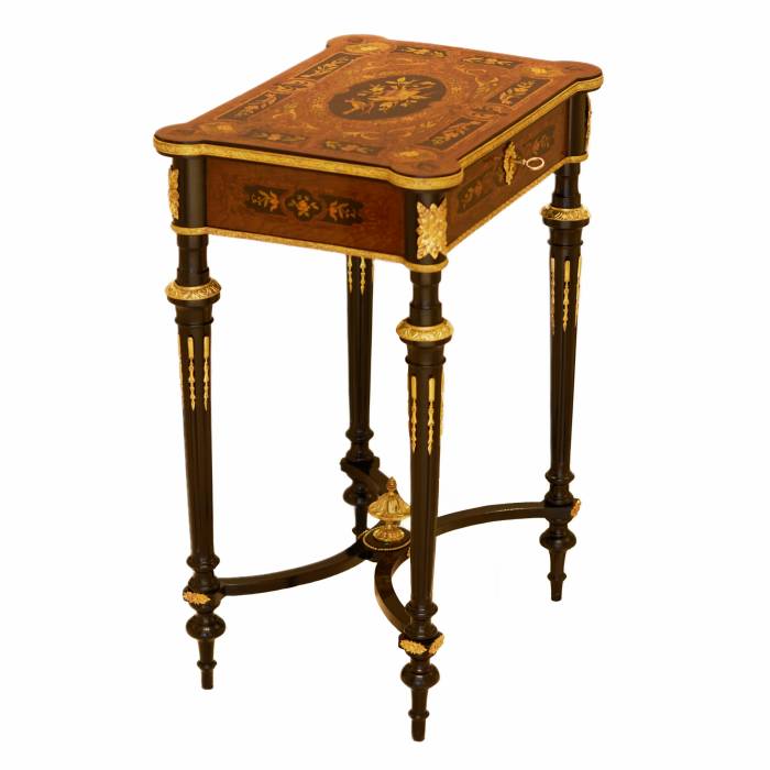 A lovely inlaid wood dressing table with gilded bronze. France late 19th century. 