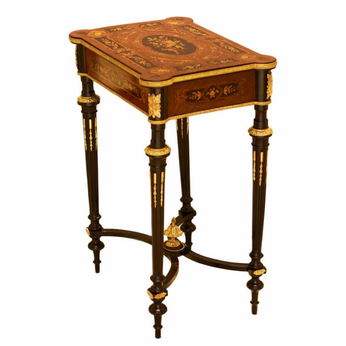 A lovely inlaid wood dressing table with gilded bronze. France late 19th century. 