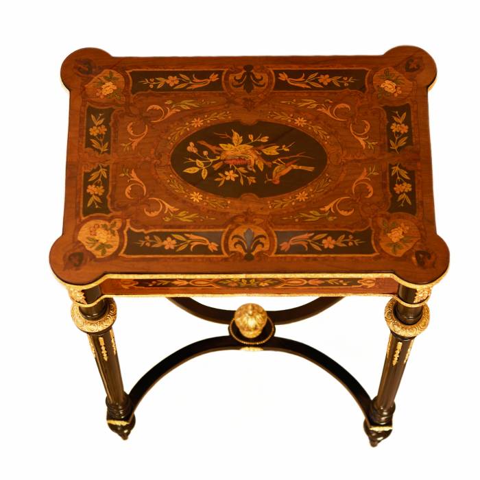 A lovely inlaid wood dressing table with gilded bronze. France late 19th century. 