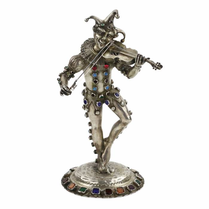 Figurine en argent d`un Arlequin jouant. Allemagne. 19ème siècle. 