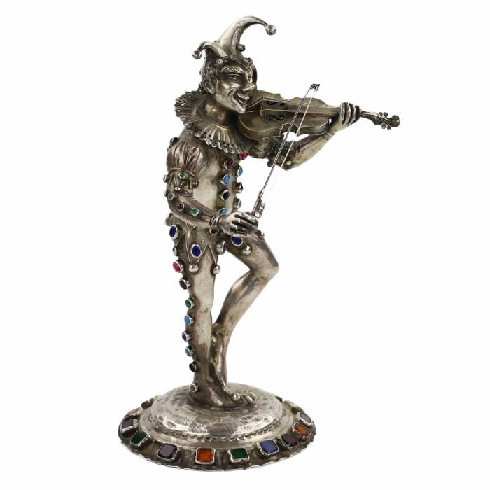 Figurine en argent d`un Arlequin jouant. Allemagne. 19ème siècle. 