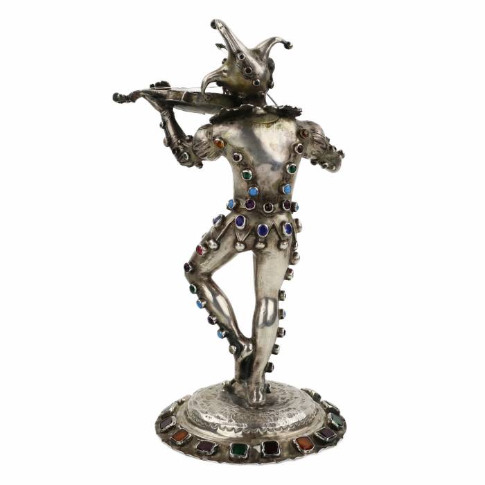 Figurine en argent d`un Arlequin jouant. Allemagne. 19ème siècle. 