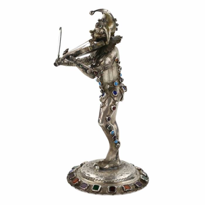 Figurine en argent d`un Arlequin jouant. Allemagne. 19ème siècle. 