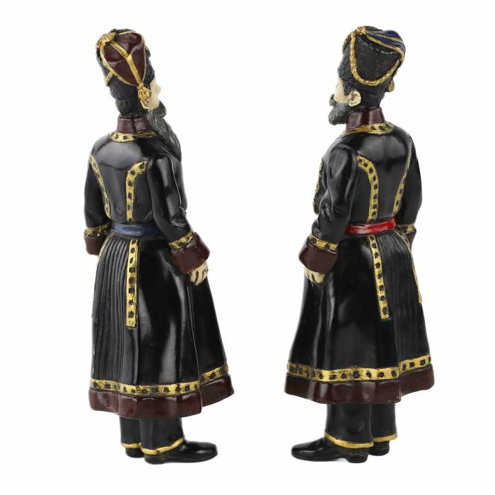 Pair of bronze figures of Russian Cossacks, personal guard of the Imperial Family. In the style of Faberge. 