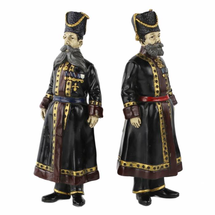 Pair of bronze figures of Russian Cossacks, personal guard of the Imperial Family. In the style of Faberge. 