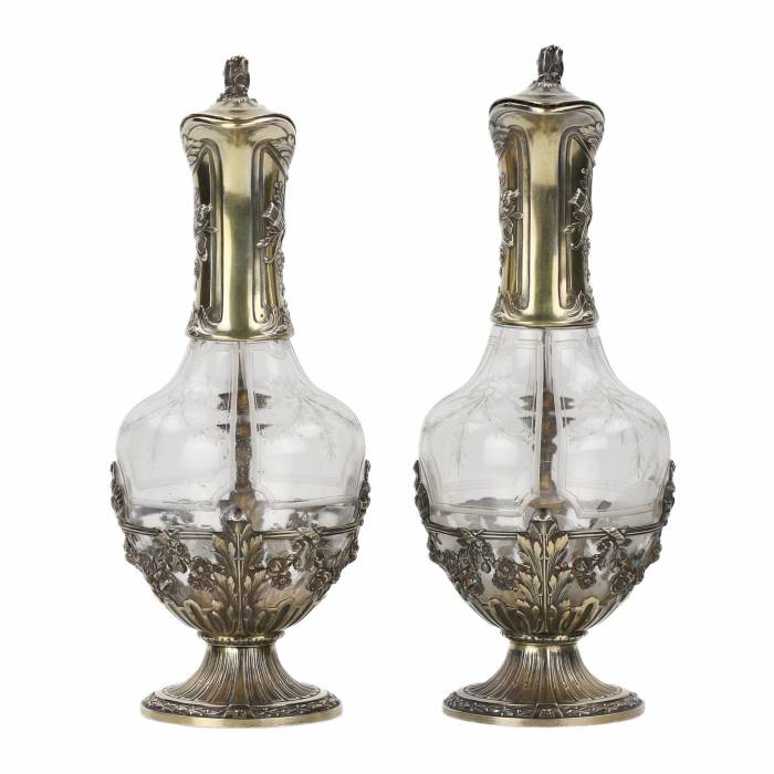 Pair of French glass wine jugs in silver from the late 19th century. 
