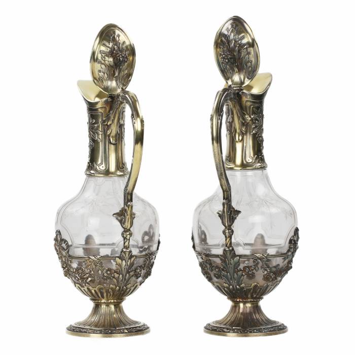 Pair of French glass wine jugs in silver from the late 19th century. 