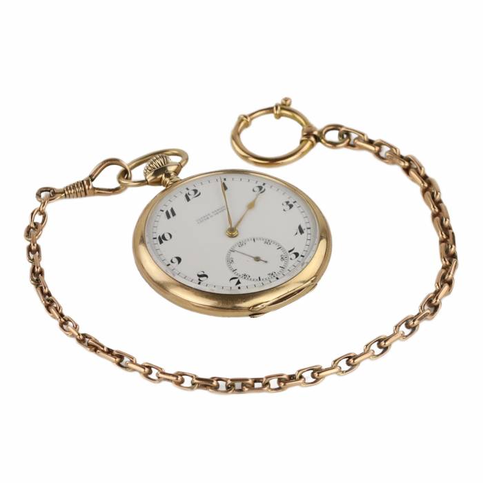 Montre de poche en or Uyisse Nardin du tournant des XIXème et XXème siècles. Dans une boîte et avec une chaîne en or. 