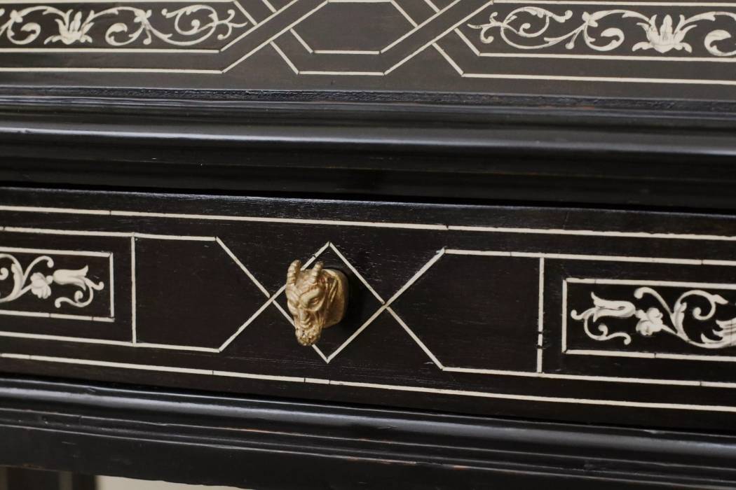 A superb Italian ebony and ivory cabinet from the late 19th century. 