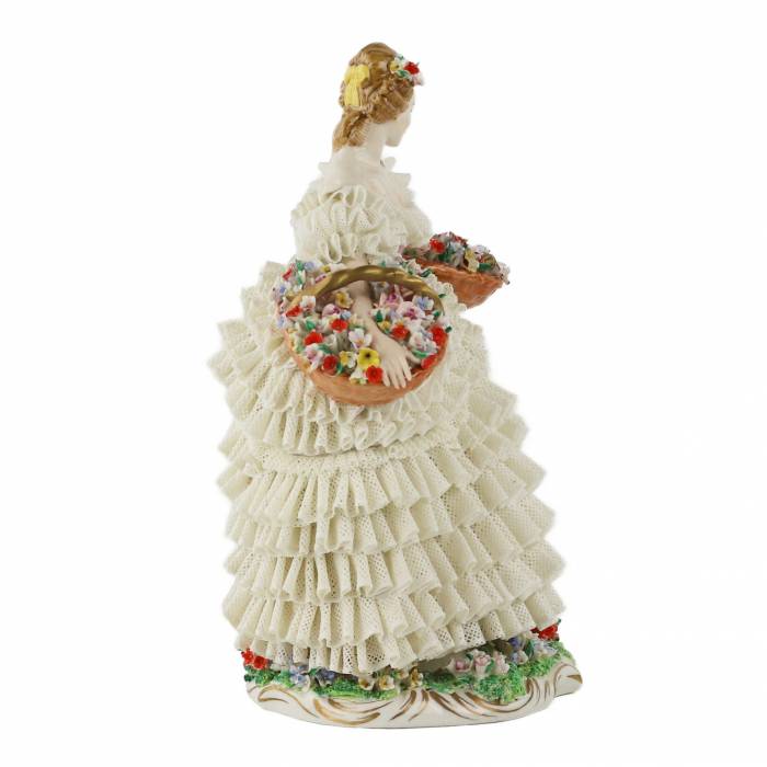  Sitzendorf Porcelain. Porcelain figurine of the Flower Girl. 20th century. 