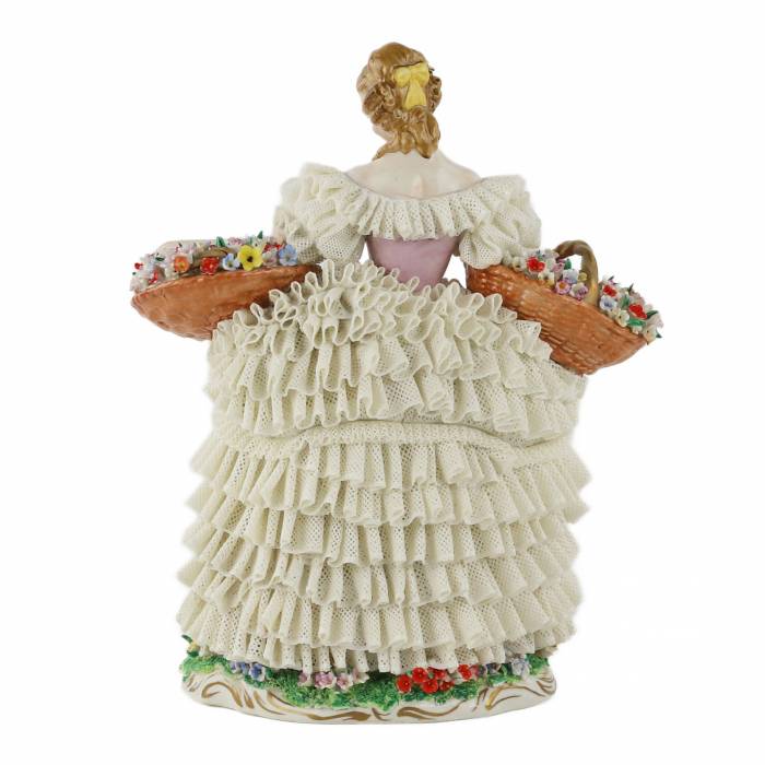  Sitzendorf Porcelain. Porcelain figurine of the Flower Girl. 20th century. 