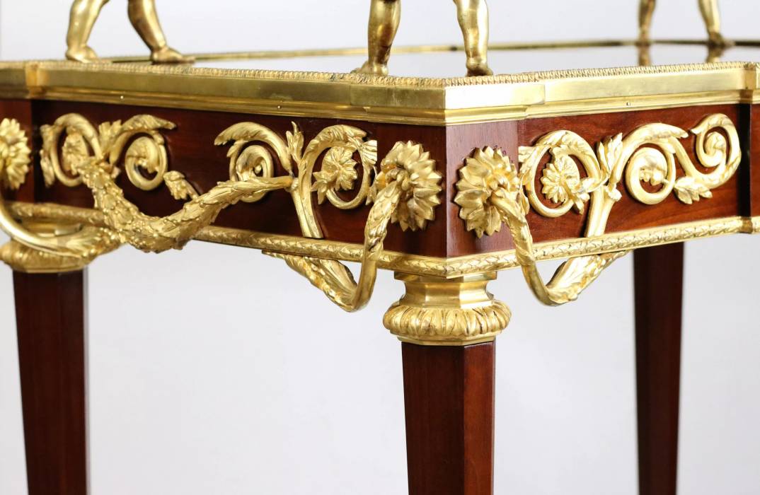 Two-tier tea table with attributes in the Louis XVI style, modeled by Francois Lincke. France, late 19th century 