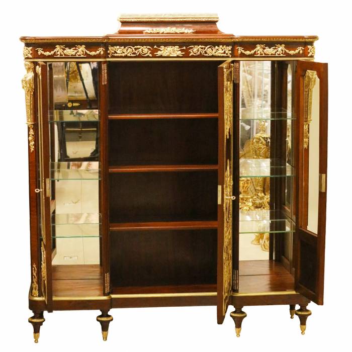 Mahogany and gilded bronze display case. Francois Linke, . France, late 19th century