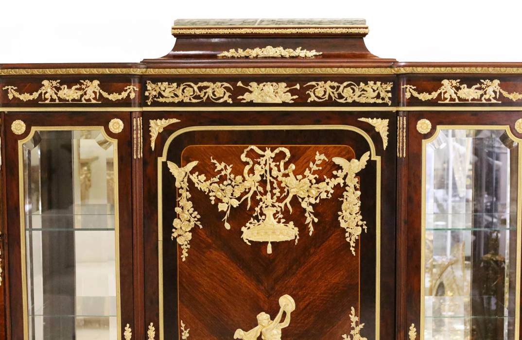 Mahogany and gilded bronze display case. Francois Linke, . France, late 19th century
