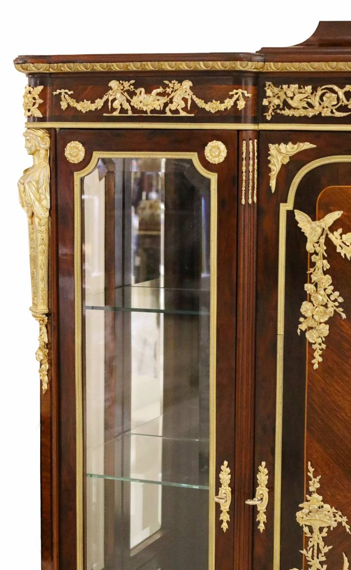 Mahogany and gilded bronze display case. Francois Linke, . France, late 19th century
