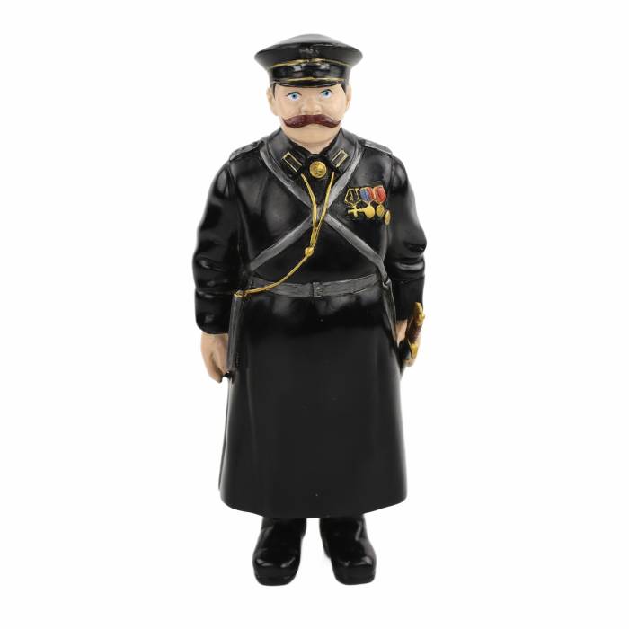 Bronze figure of a policeman, painted with cold enamels according to the Faberge model. St. Petersburg, 1911. 