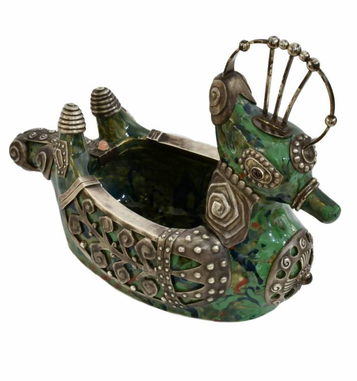 A KOVSH-LADYA IN THE FORM OF A FAIRY-TALE BIRD IMPERIAL STROGANOV SCHOOL OF INDUSTRIAL ART, WITH A SILVER MOUNT BY THE FIRM OF KARL FABERGÉ RUSSIA, MOSCOW, 1908–1917