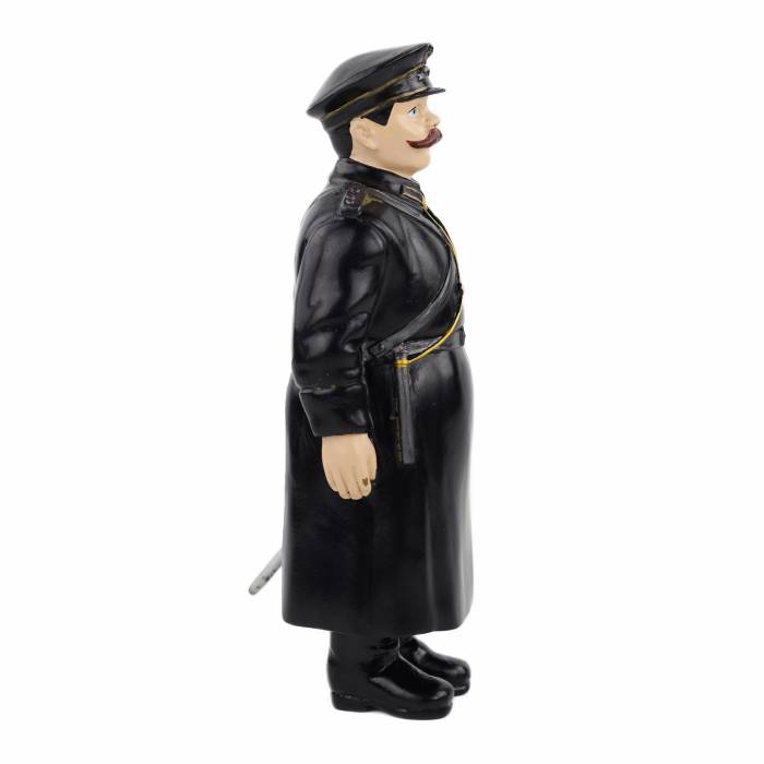 BRONZE FIGURINE OF A POLICEMAN, PAINTED WITH COLD ENAMELS AFTER A FABERGÉ MODEL RUSSIA, SAINT PETERSBURG, 1911