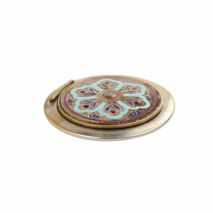 Miroir de dame orné d`un motif en émail. XXe siècle. 